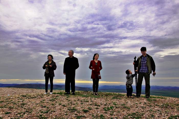 Group photo on an unnamed summit in Bashang