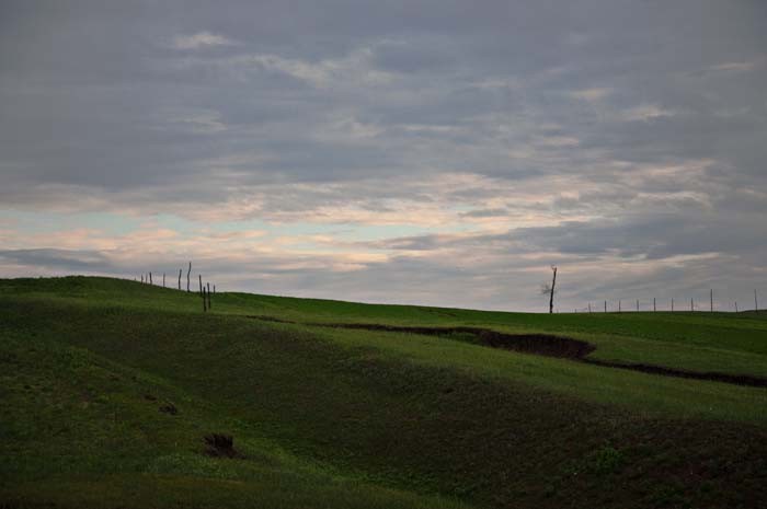People heading up the hill at dusk