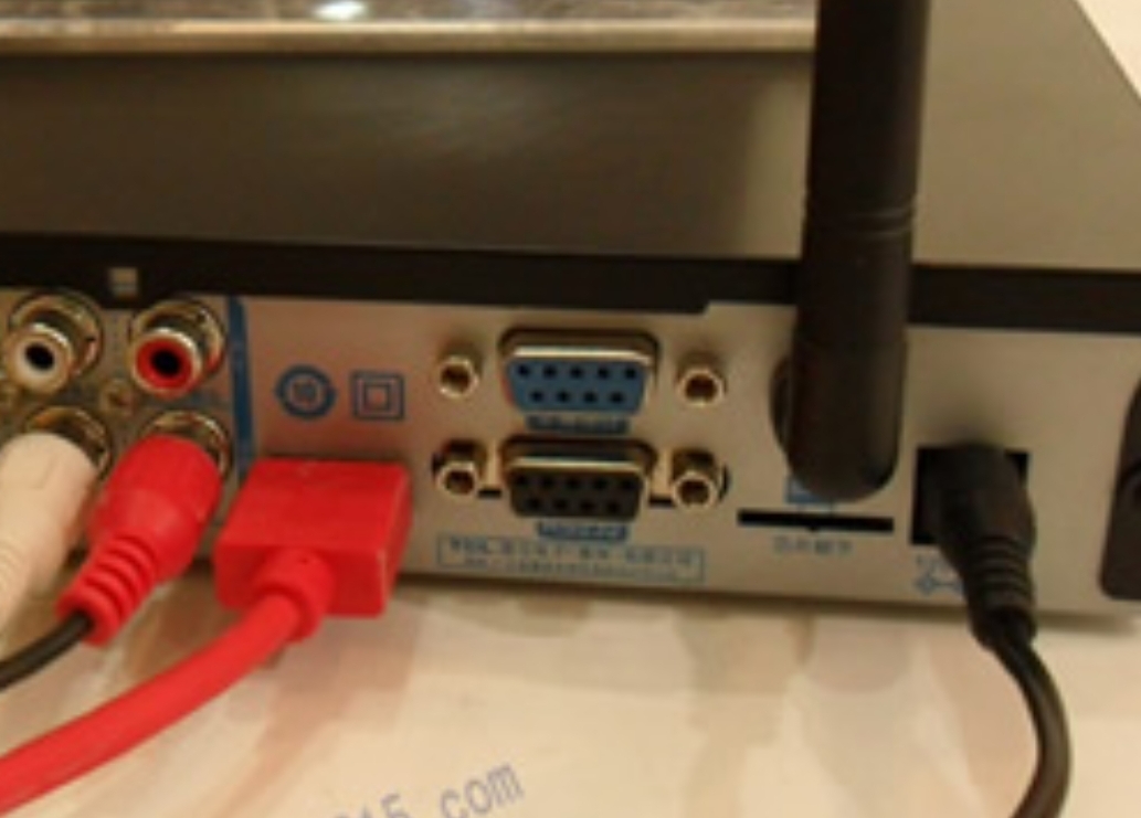 The black connector is the motherboard serial port; the blue one is an “expansion interface,” reportedly for a dedicated telephone handset, though such a machine is rarely seen