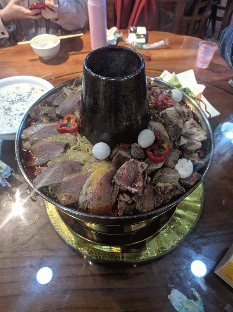 Yak meat hotpot, with fermented rice soup on the side